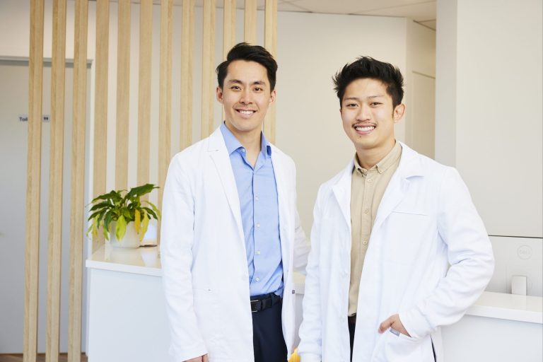 Two Dove Dental dentists standing together in the Waurn Ponds clinic